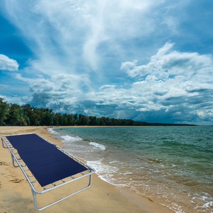 Catre de Lona XL en la playa, ideal para descanso al aire libre.